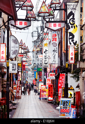 License available at MaximImages.com - Narrow street filled with colorful restaurant signs in Nakano, Tokyo, Japan. Stock Photo