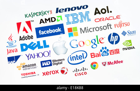 A logotype collection of well-known world top companies of computer technologies on a monitor screen Stock Photo