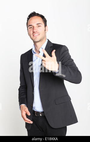 Businessman counting number three Stock Photo