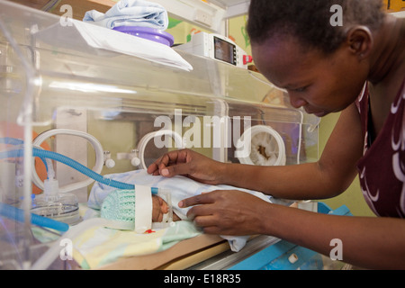 A premature baby receives care in the Special Care Baby Unit at Mulago Hospital in Kampala, Uganda. Stock Photo