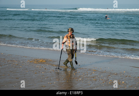 treasure hunter on beach Stock Photo