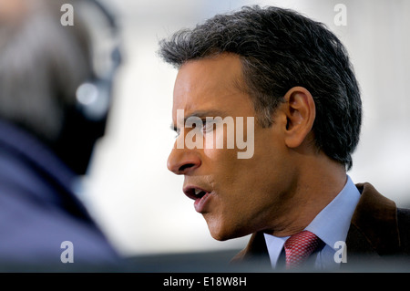 Matthew Amroliwala (BBC television newsreader) doing an outside election broadcast from College Green, Westminster. 2014 Stock Photo