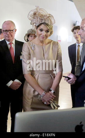 Essen, Germany. 27th May, 2014. Queen Maxima of the Netherlands looks at a new design displayed on a computer screen at the Dutch-German MMID centre for creativity in Essen, Germany, 27 May 2014. The Dutch royal couple is on a two-day visit to Germany. Photo: Oliver Berg/dpa/Alamy Live News Stock Photo