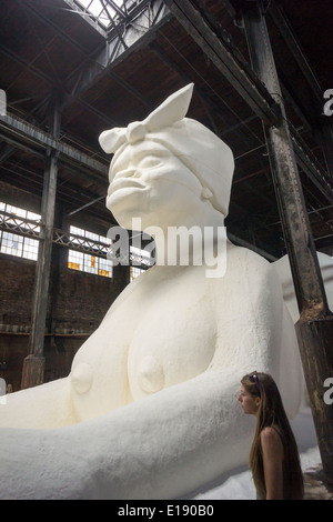 'A Subtlety' or 'The Marvelous Sugar Baby' by the artist Kara Walker is displayed in the former Domino Sugar Factory Stock Photo