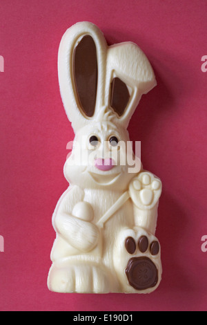 Thorntons Harry Hopalot white chocolate Easter bunny rabbit isolated on pink background Stock Photo