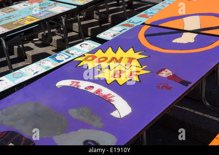 School lunchroom tables decorated with art representing various social issues are seen in Union Square Park in New York Stock Photo