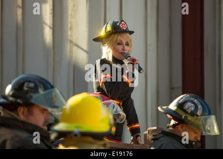 Dolly Parton inaugurates the new FireChaser Express roller coaster dressed as a fireman in Dollywood theme park in Pigeon Forge Stock Photo