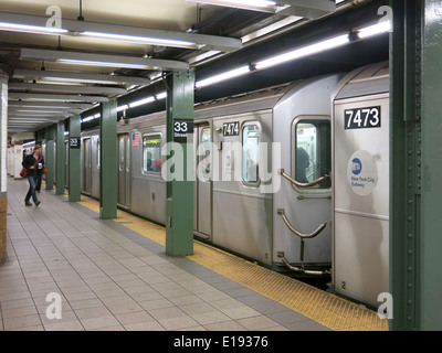 33rd Street Subway Station Platform and Train, NYC, USA Stock Photo