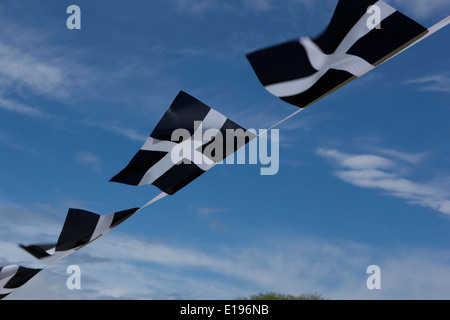 Cornish Flag (Kernow) bunting flying in cornwall on a windy day, Stock Photo