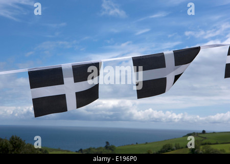 Cornish Flag (Kernow) bunting flying in cornwall on a windy day, Stock Photo