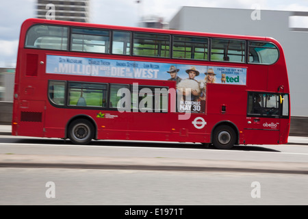 A London double decker bus on the move going over Waterloo Bridge in London, England Stock Photo