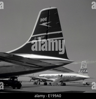 1950s historical picture of a tail of a OAC Bristol Britannia G-ANBF Airliner Aircraft Airplane on the runway at London Airport. Stock Photo