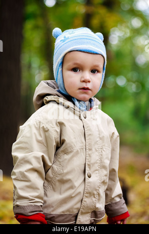 Portrait of little baby boy in the park Stock Photo