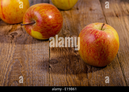 Apples on a wooden table. Stock Photo