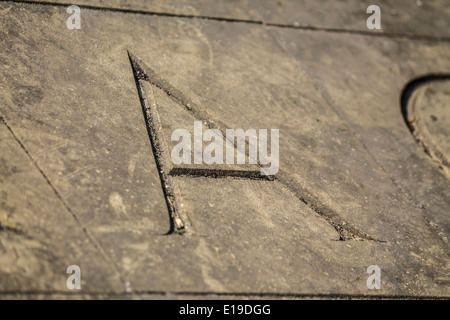 A carved letter A in a stone slab Stock Photo