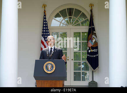 Washington, DC, USA. 27th May, 2014. U.S. President Barack Obama speaks at the Rose Garden of the White House in Washington, DC, the United States, May 27, 2014. U.S. Obama said on Tuesday that he planned to leave 9,800 American troops in Afghanistan beyond 2014. Credit:  Yin Bogu/Xinhua/Alamy Live News Stock Photo