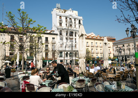 Outdoor restaurant tables at Plaza Santa Ana, Barrio de las Letras, Madrid, Spain Stock Photo