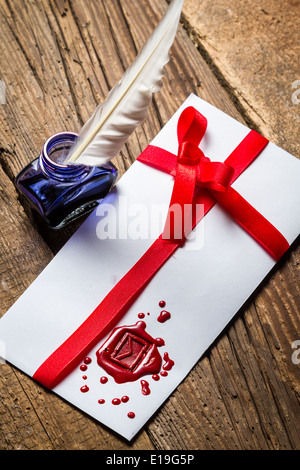 Elegant letter with red sealant and blue ink Stock Photo