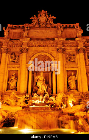 view of Fontana di Trevi illuminated at night in Rome, Italy Stock Photo