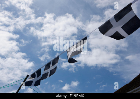 Cornish (Kernow) bunting flying in cornwall on a windy day, Stock Photo