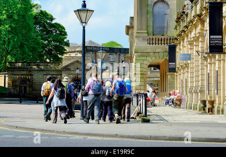 A group of hikers walking through Buxton Derbyshire England UK Stock Photo