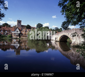 Aylesford Kent with its stone bridge,church and riverside pub all reflected in the river Medway. Stock Photo