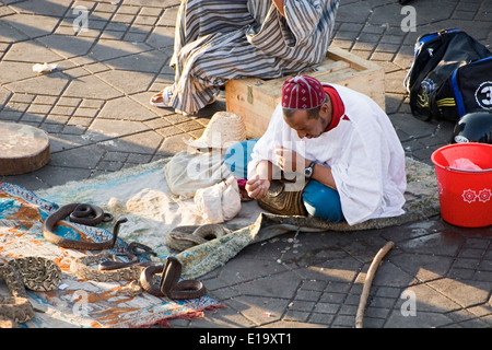 A snake charmer in Djemaa El Fna Square in Marrakech