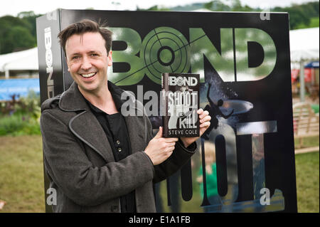 Steve Cole with his new Young Bond novel 'Shoot to Kill' at Hay Festival 2014.  ©Jeff Morgan Stock Photo