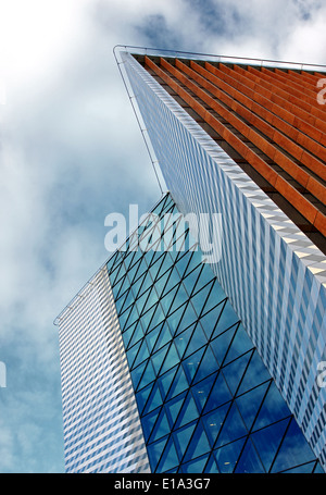 Blue modern office building with clouds reflection Stock Photo - Alamy