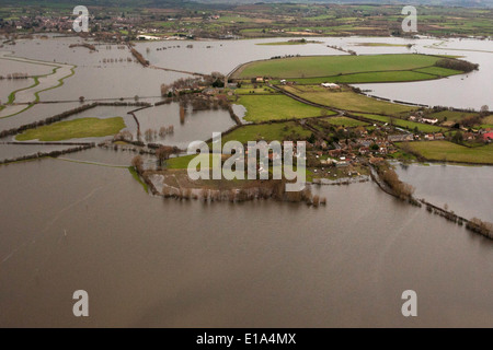 Aerial picture of the village of Muchelney, Somerset, and the surrounding areas surrounded by flood water. Stock Photo