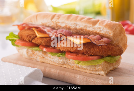 A delicious crispy chicken clubhouse submarine sandwich. Stock Photo