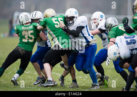 Tarannau, Aberystwyth University american football team (in white) playing a league game Wales UK Stock Photo