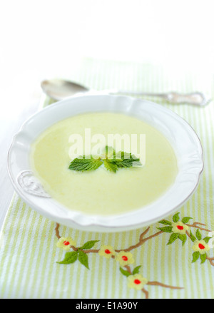 Delicious vegetable soup with potato, zucchini and cream. Stock Photo