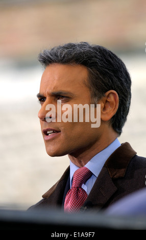 Matthew Amroliwala (BBC television newsreader) doing an outside election broadcast from College Green, Westminster. 2014 Stock Photo