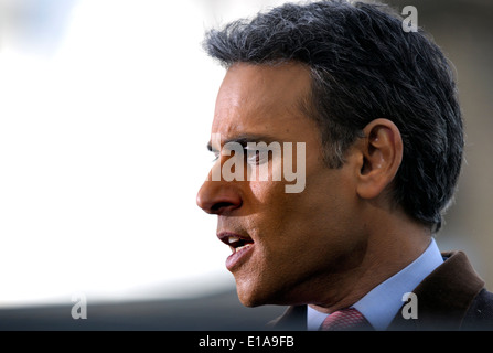 Matthew Amroliwala (BBC television newsreader) doing an outside election broadcast from College Green, Westminster. 2014 Stock Photo