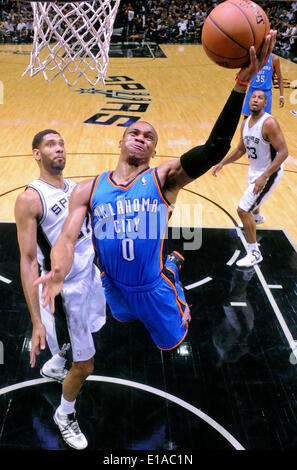 May 21, 2014 - San Antonio, TEXAS, USA - San Antonio Spurs' Tim Duncan defends Oklahoma City Thunder's Russell Westbrook during first half action of Game 2 in the Western Conference Finals Wednesday May 21, 2014 at the AT&T Center. (Credit Image: © San Antonio Express-News/ZUMAPRESS.com) Stock Photo