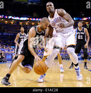 May 25, 2014 - Oklahoma City, OKLAHOMA, USA - San Antonio Spurs' Tony Parker looks for room around Oklahoma City Thunder's Serge Ibaka during second half action in Game 3 of the Western Conference Finals Sunday May 25, 2014 at Chesapeake Energy Arena in Oklahoma City, OK. The Thunder won 106-97. (Credit Image: © San Antonio Express-News/ZUMAPRESS.com) Stock Photo