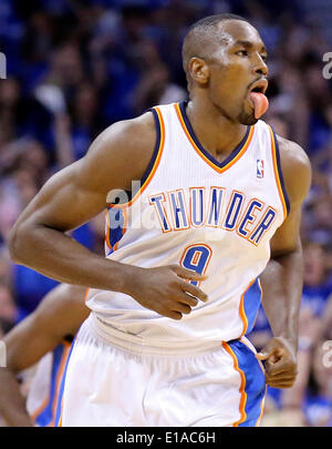 May 25, 2014 - Oklahoma City, OKLAHOMA, USA - Oklahoma City Thunder's Serge Ibaka reacts after scoring during first half action in Game 3 of the Western Conference Finals against the San Antonio Spurs Sunday May 25, 2014 at Chesapeake Energy Arena in Oklahoma City, OK. (Credit Image: © San Antonio Express-News/ZUMAPRESS.com) Stock Photo