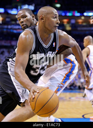 May 27, 2014 - Oklahoma City, OKLAHOMA, USA - San Antonio Spurs' Boris Diaw looks for room around Oklahoma City Thunder's Kevin Durant during second half action in Game 4 of the Western Conference Finals Tuesday May 27, 2014 at Chesapeake Energy Arena in Oklahoma City, OK. (Credit Image: © San Antonio Express-News/ZUMAPRESS.com) Stock Photo