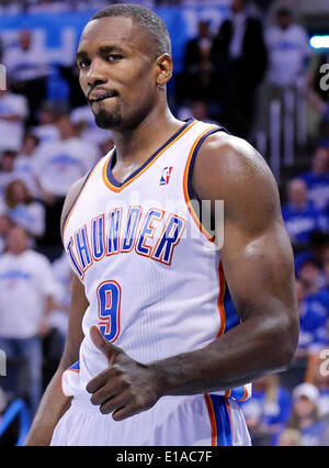 May 27, 2014 - Oklahoma City, OKLAHOMA, USA - Oklahoma City Thunder's Serge Ibaka reacts after a play during second half action in Game 4 of the Western Conference Finals against the San Antonio Spurs Tuesday May 27, 2014 at Chesapeake Energy Arena in Oklahoma City, OK. (Credit Image: © San Antonio Express-News/ZUMAPRESS.com) Stock Photo