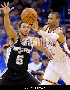 May 27, 2014 - Oklahoma City, OKLAHOMA, USA - Oklahoma City Thunder's Russell Westbrook passes around San Antonio Spurs' Cory Joseph during second half action in Game 4 of the Western Conference Finals Tuesday May 27, 2014 at Chesapeake Energy Arena in Oklahoma City, OK. (Credit Image: © San Antonio Express-News/ZUMAPRESS.com) Stock Photo