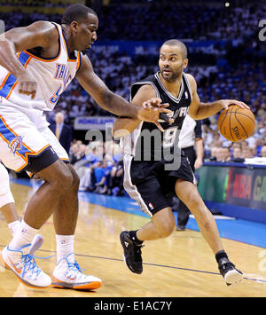 May 27, 2014 - Oklahoma City, OKLAHOMA, USA - San Antonio Spurs' Tony Parker looks for room around Oklahoma City Thunder's Kendrick Perkins during first half action in Game 4 of the Western Conference Finals Tuesday May 27, 2014 at Chesapeake Energy Arena in Oklahoma City, OK. (Credit Image: © San Antonio Express-News/ZUMAPRESS.com) Stock Photo