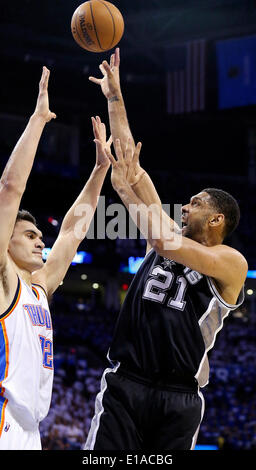 May 27, 2014 - Oklahoma City, OKLAHOMA, USA - San Antonio Spurs' Tim Duncan shoots over Oklahoma City Thunder's Steven Adams during first half action in Game 4 of the Western Conference Finals Tuesday May 27, 2014 at Chesapeake Energy Arena in Oklahoma City, OK. (Credit Image: © San Antonio Express-News/ZUMAPRESS.com) Stock Photo