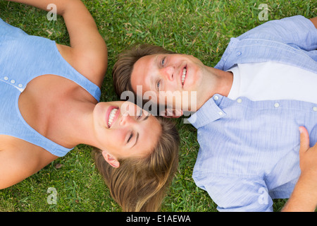 Portrait of happy young couple outside Stock Photo