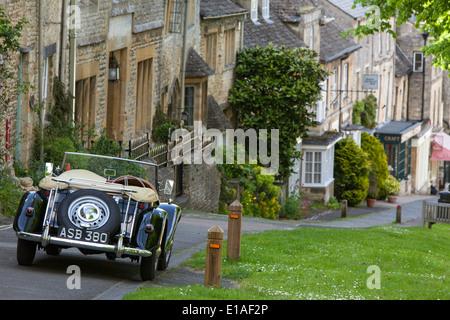 A black MG TF classic car parked in the Cotswold town of Burford, Oxfordshire,  England ,UK Stock Photo