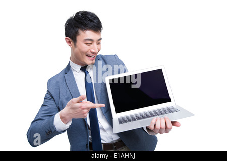 Young businessman with laptop Stock Photo