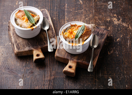 Onion soup with dried bread, sage and cheddar cheese Stock Photo