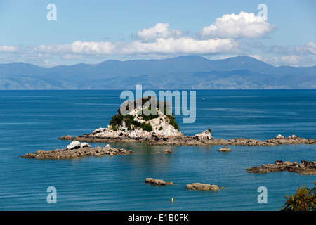 Rocky outcrop on Little Kaiteriteri beach, Little Kaiteriteri, Nelson region, South Island, New Zealand, South Pacific Stock Photo