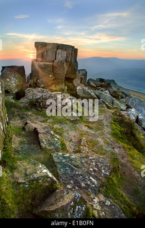 Looking west into the setting sun from the top of the Sugar Loaf mountain, Monmouthshire. Stock Photo