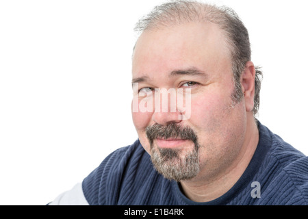 Close-up portrait of a mature man smiling and squinting the eyes Stock Photo